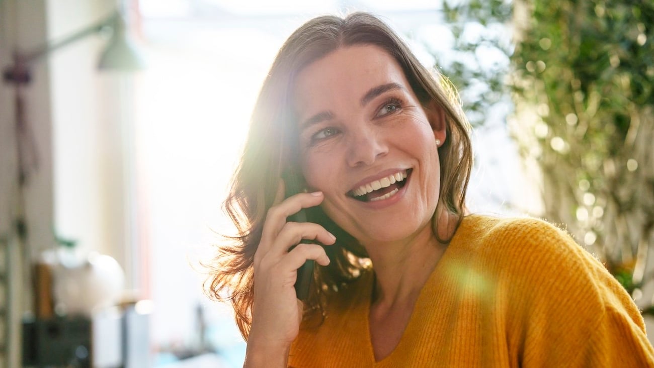 woman holding phone