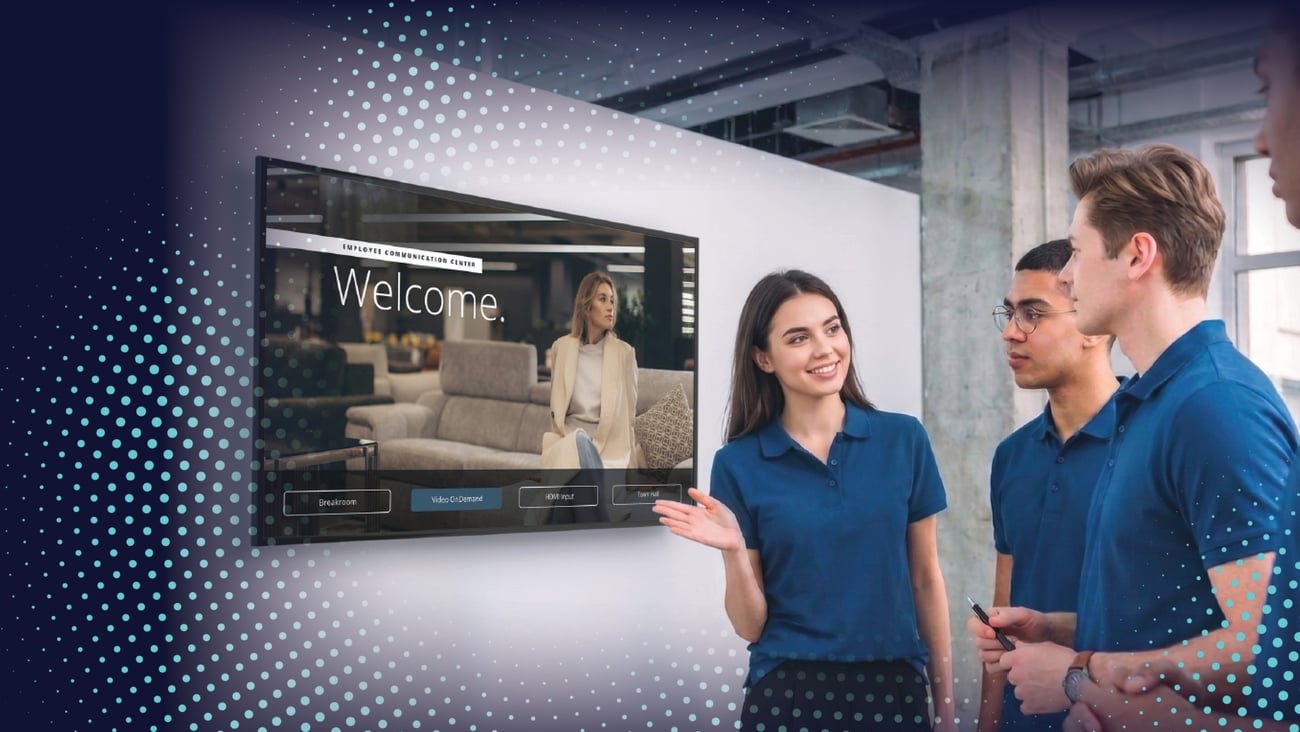 3 people looking at a tv screen