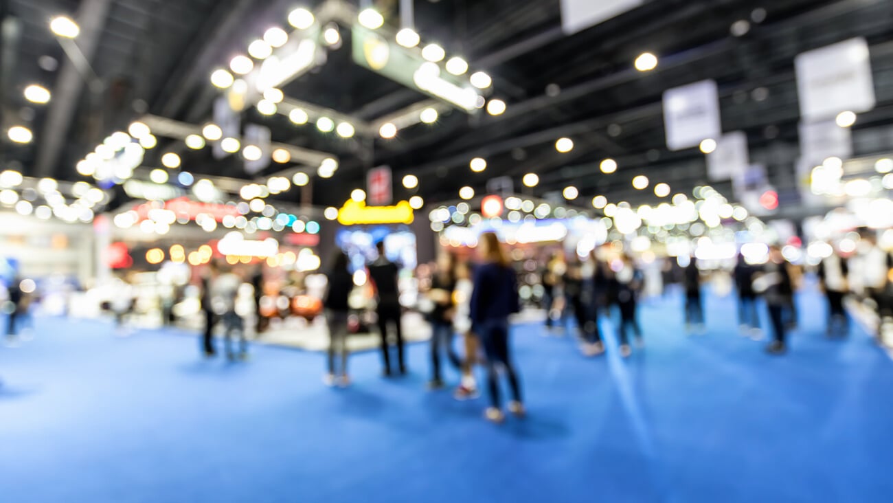 Abstract blurred defocused trade event exhibition background, business convention show concept.; Shutterstock ID 1058263202