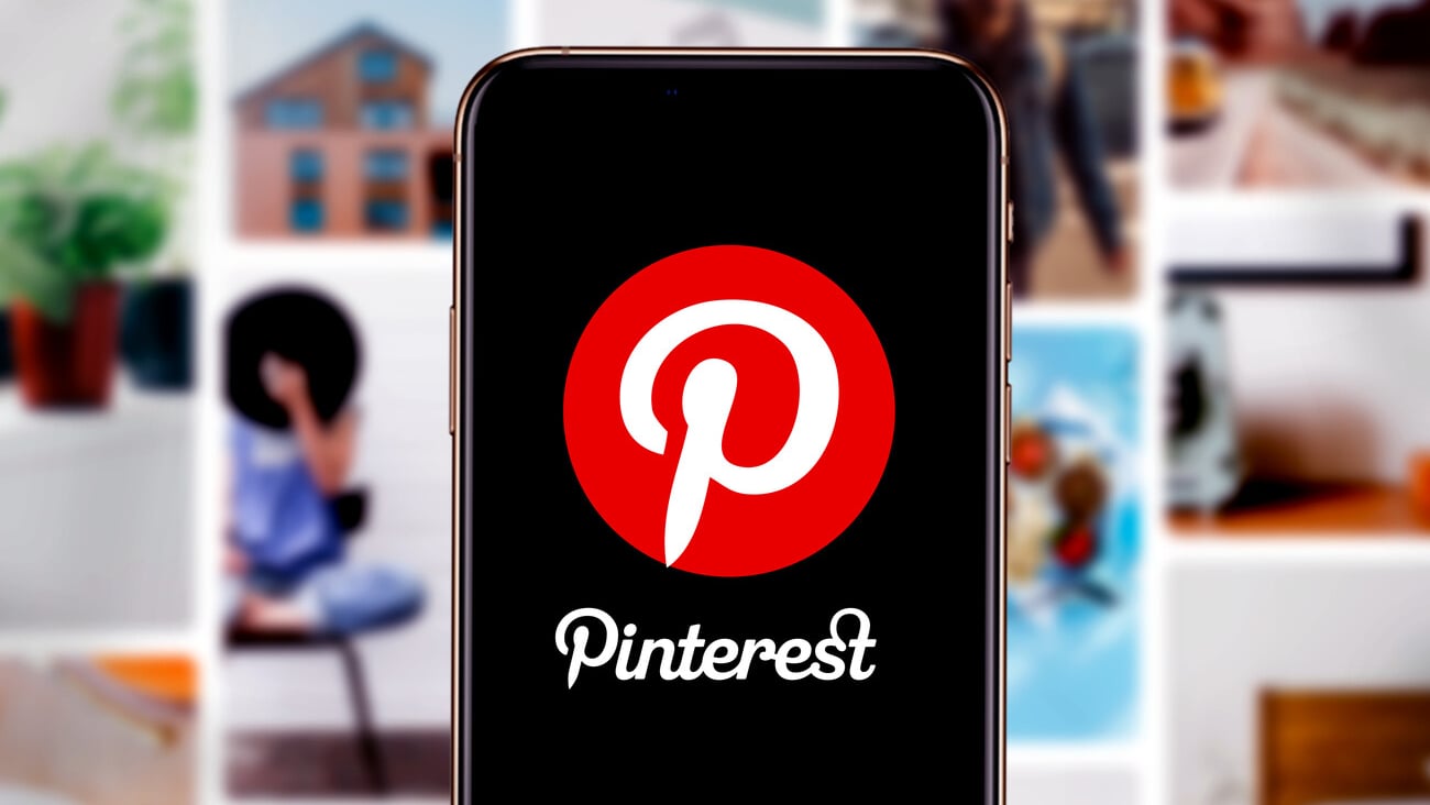 Smart phone with the Pinterest logo that is a platform that allows users to create and manage different themes.