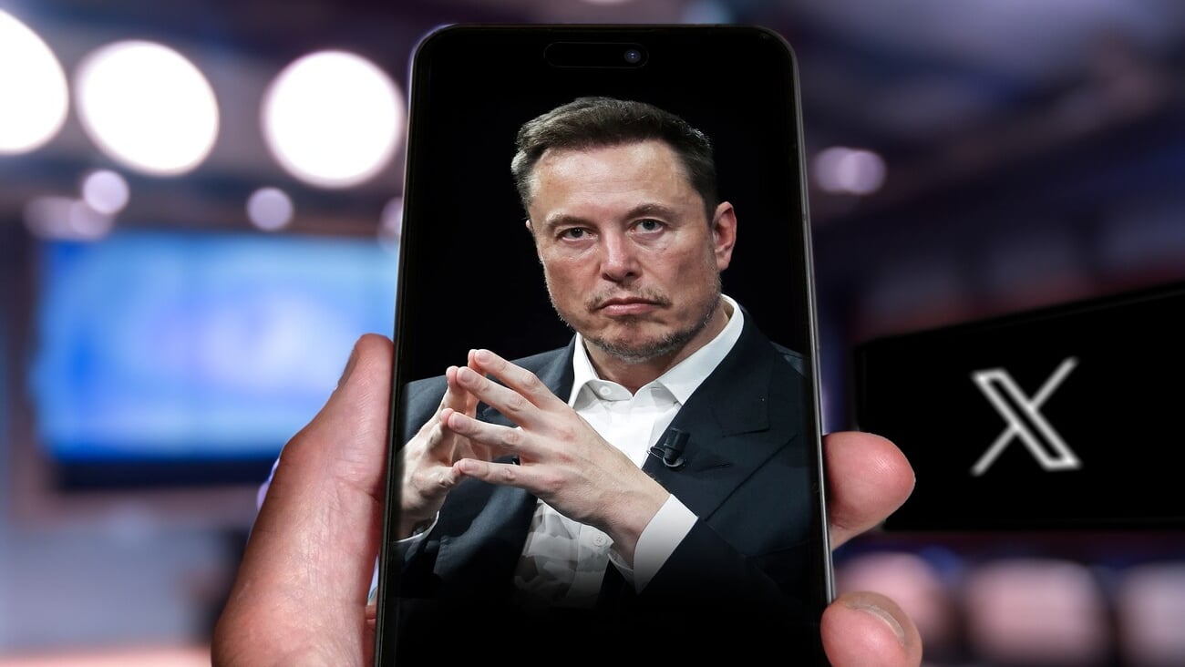 Man hand holding Phone displaying Elon musk photo on the screen, x logo on the background Twitter has officially rebranded to X after owner Elon Musk changed its bird logo. Qatar, September 1, 2023; Shutterstock ID 2355755599
