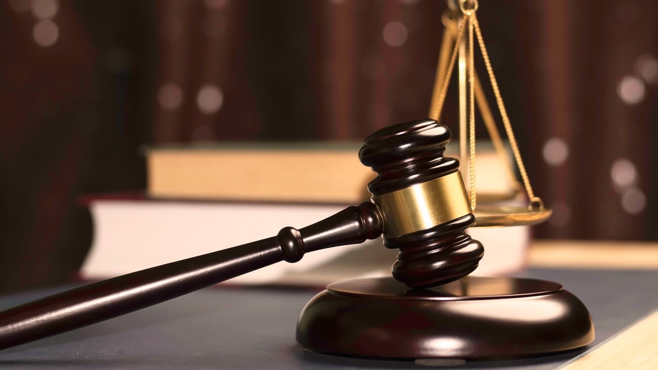 Lawyer's hand concept Justice with Judge gavel, Businessman in suit or Hiring lawyers in the digital system. Legal law, prosecution, legal adviser, lawsuit, detective, investigation,legal consultant.; Shutterstock ID 2403189221
