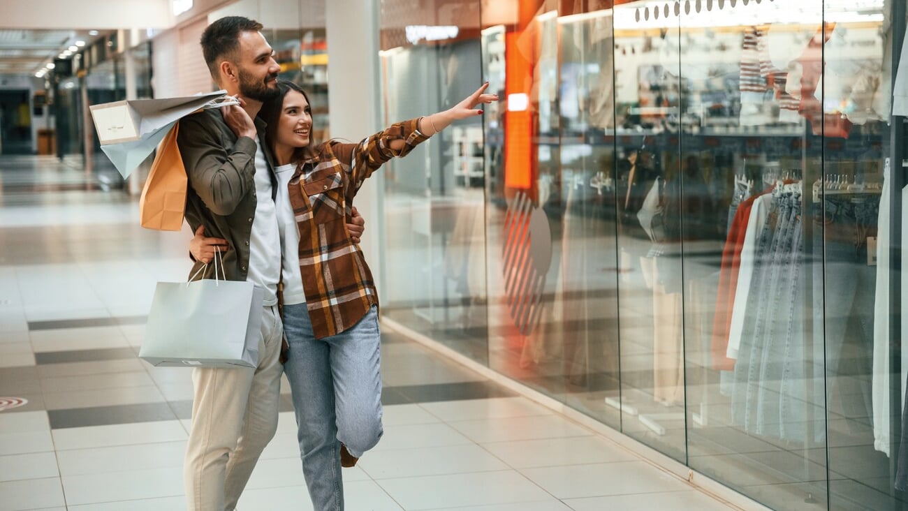 Conception of weekend and shopping. Young couple are in supermarket together.; Shutterstock ID 2447881521