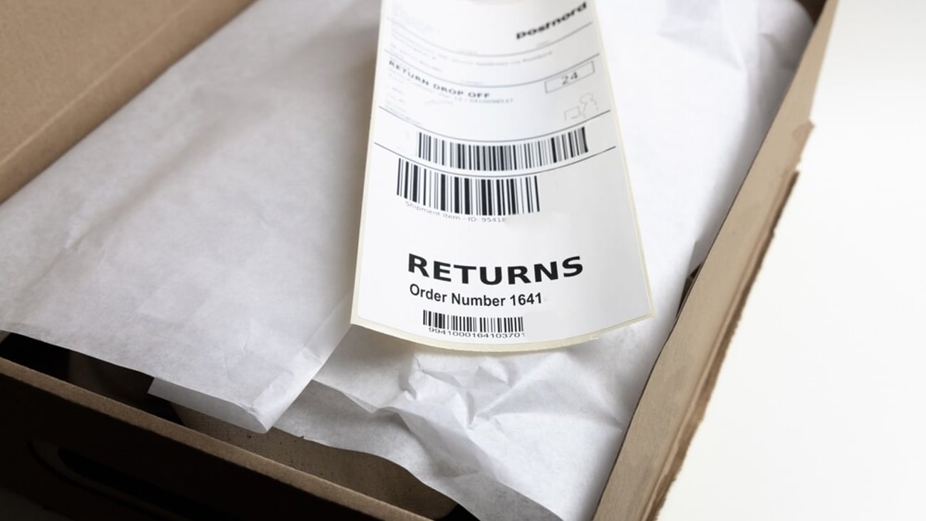 Packaging with return label ready for return. Copenhagen, Denmark - March 22, 2025; Shutterstock ID 2601921271