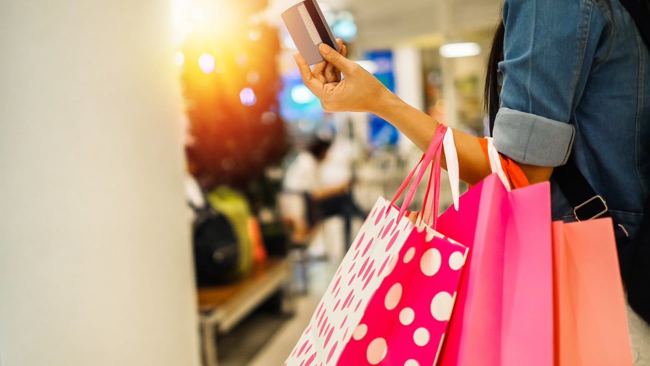 Asia beautiful woman carrying shopping bag and walking in the department store.young lady shopping by using credit card on weekend.; Shutterstock ID 770042947
