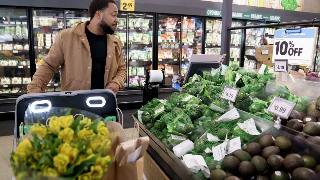 A shopper at an Amazon Fresh store (Photo: Amazon).