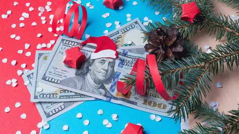 money covered in holiday cheer