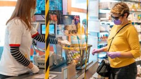 people in store with masks