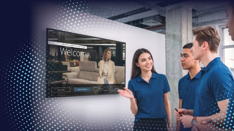 3 people looking at a tv screen
