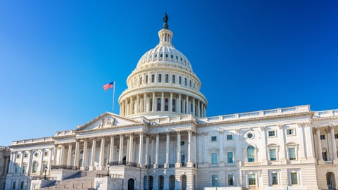 US Capitol over blue sky; Shutterstock ID 1514468156
