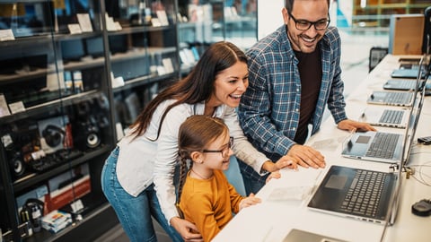 Happy family buying laptop in store.; Shutterstock ID 1841450527