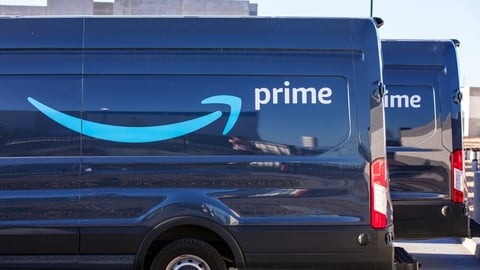 Henderson, NV, USA 10-15-2021: Blue Amazon Prime delivery van with its logo on the side of the car. Captured at the distribution facility center in the Las Vegas Valley area.; Shutterstock ID 2059925207
