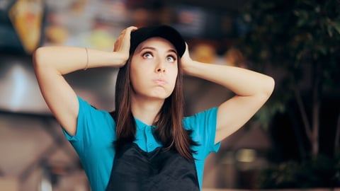 Stressed Fast Food Worker Feeling Overwhelmed Doing Overtime. Retail employee having an awful schedule feeling exhausted and desperate; Shutterstock ID 2137931143
