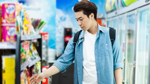 image of Asian man shopping at a convenience store; Shutterstock ID 2304649571