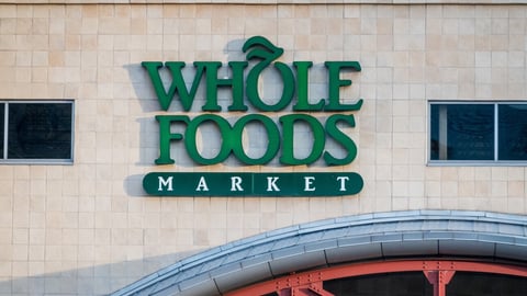 Denver, CO - May 15 2024:  A sign for Whole Foods Market graces the facade of a building. ; Shutterstock ID 2464497601