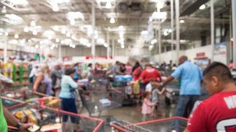 Blur image cashier with line of people at checkout counter. Customers paying with credit card to store employee in wholesale. Cashier register, computer on sales counter, checkout payment terminal.; Shutterstock ID 487455493