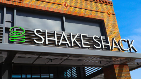 Glendale, California, United States – April 1, 2019: Shake Shack sign. Entrance view. Shake Shack logo. Shake Shack is a trendy food chain known for quality. American fast casual restaurant chain. ; Shutterstock ID 1356484064