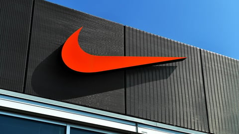 Honfleur, France - April 29th 2023 - Nike Logo on a front store of the Outlet of Honfleur - Normandy; Shutterstock ID 2296842939