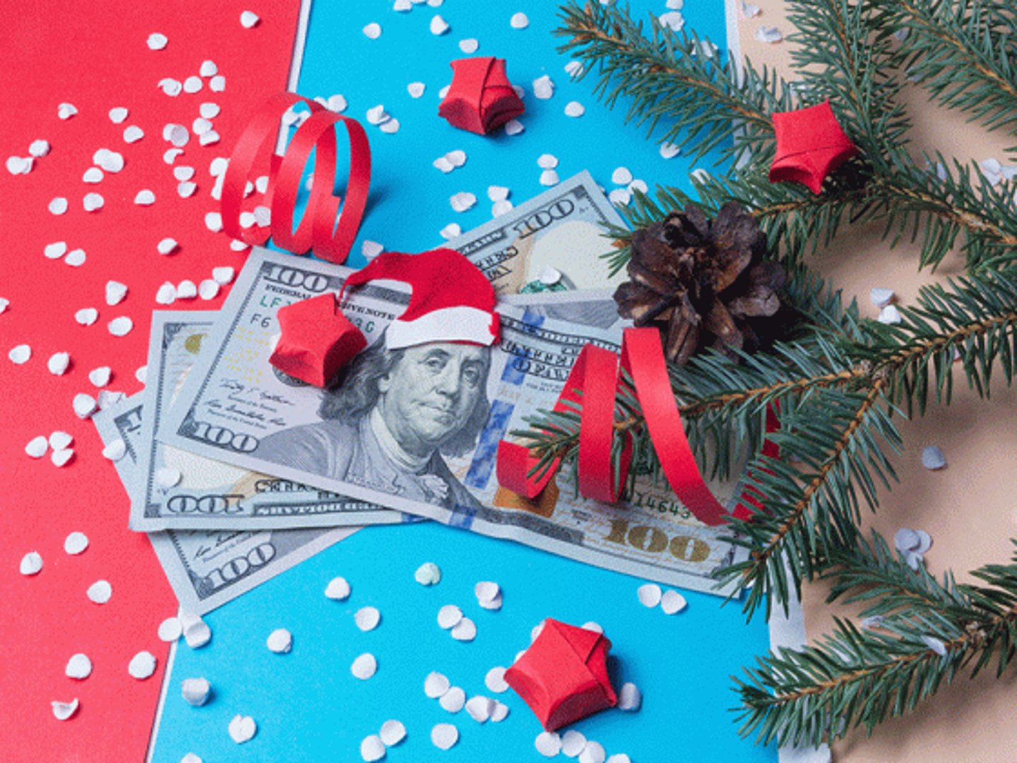 money covered in holiday cheer