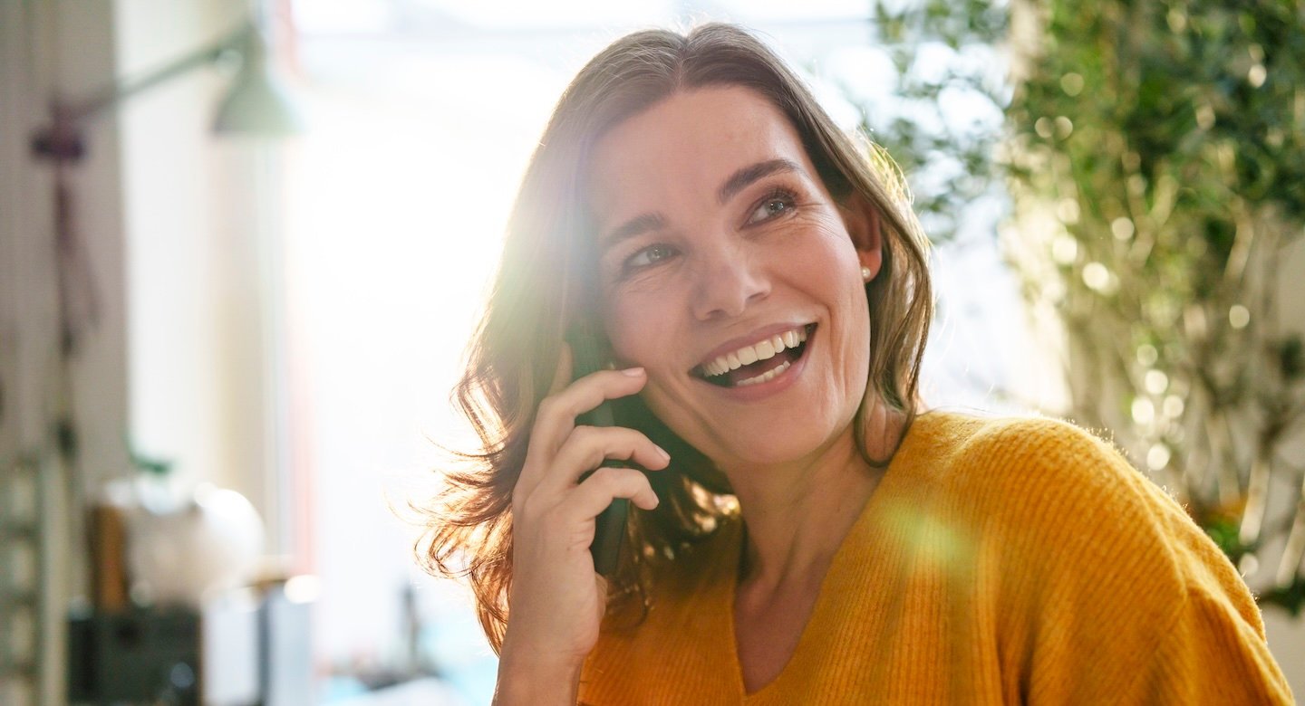 woman holding phone