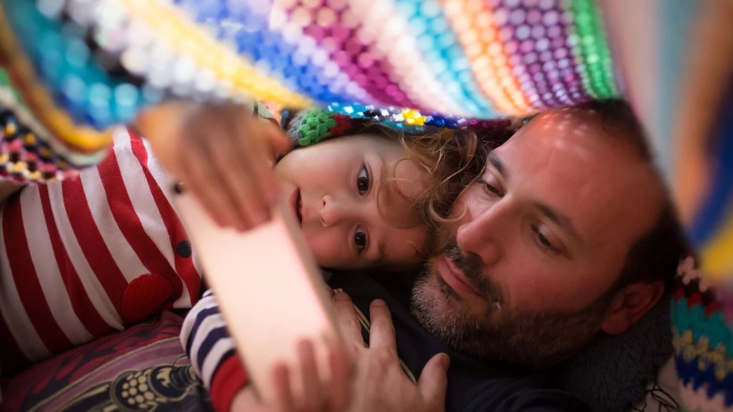 Dad and daughter on phone