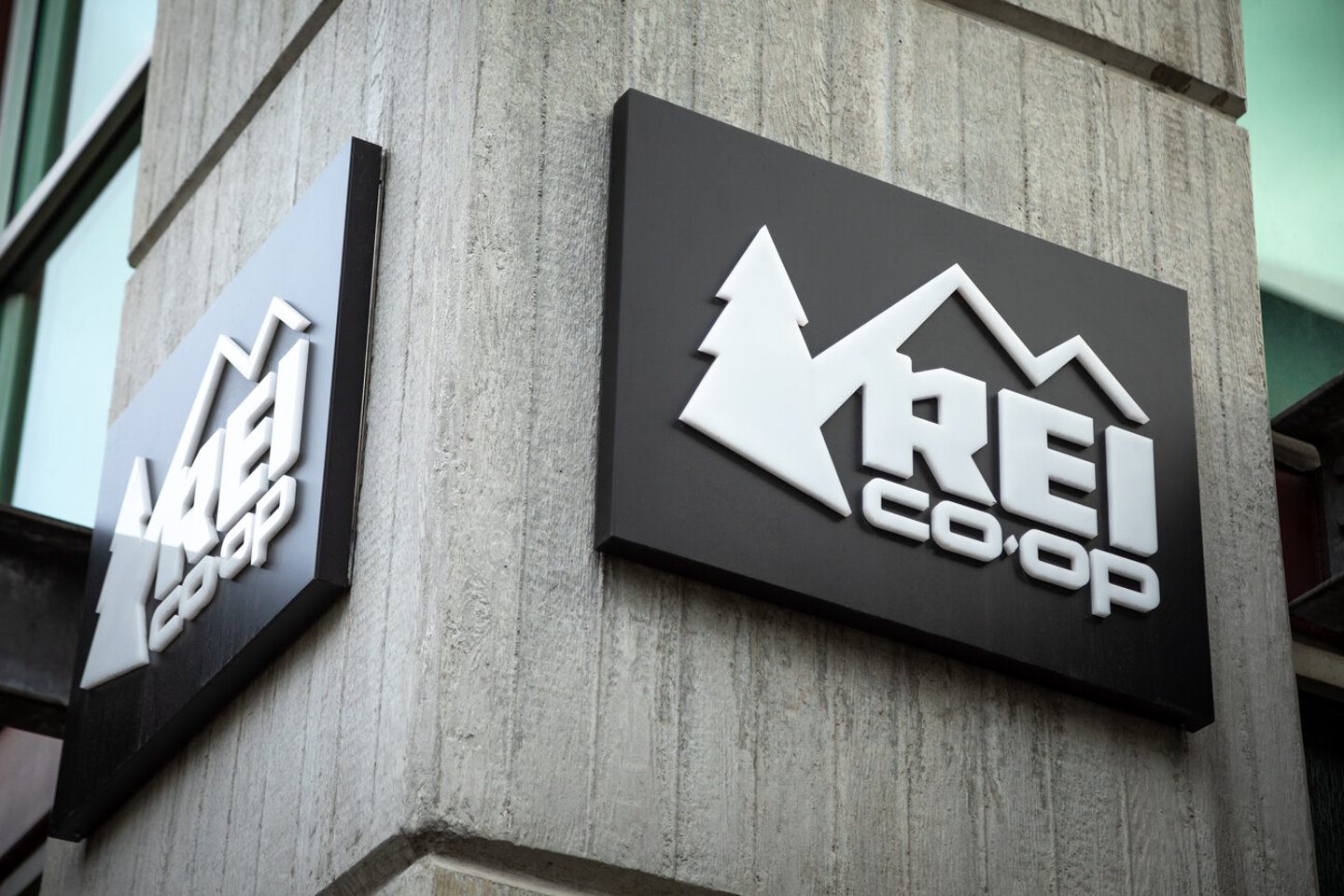 Seattle, Washington / USA - January 20 2019: Signs for Recreational Equipment Incorporated (REI), on the corner of the Seattle flagship store for the outdoor outfitter; Shutterstock ID 1292420836