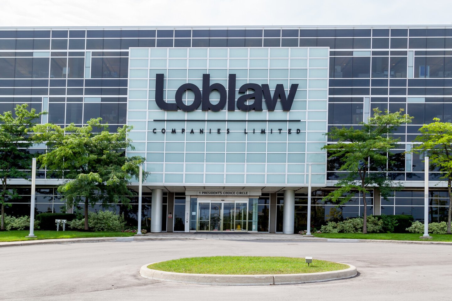 Brampton, Ontario, Canada- August 25, 2018: Entrance of Loblaws Corporate Office Headquarters in Brampton. Loblaws Inc. is a supermarket chain with over 2,000 stores in Canada.; Shutterstock ID 1326984296