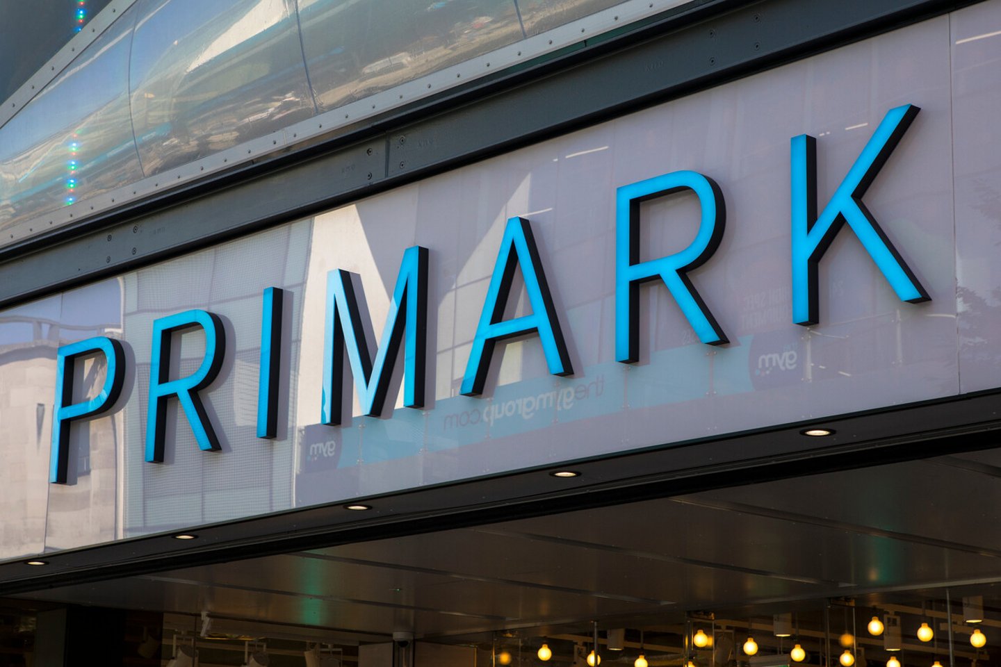 Birmingham, UK - September 20th 2019: The Primark logo above the entrance to its store in the city of Birmingham, UK. It is the biggest Primark store in the world.; Shutterstock ID 1518526598