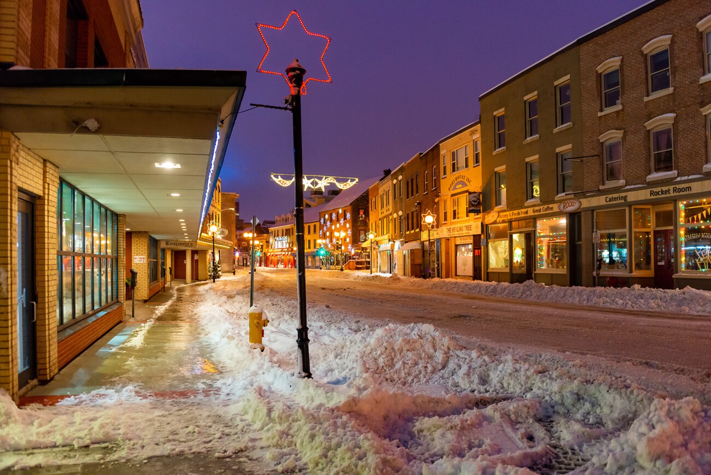 St. John's, Newfoundland, Canada - January 2020: A major snowstorm hit St. John's dumping a record amount of snow on the city. The streets have been cleared but the city is under a state of emergency.; Shutterstock ID 1621390024