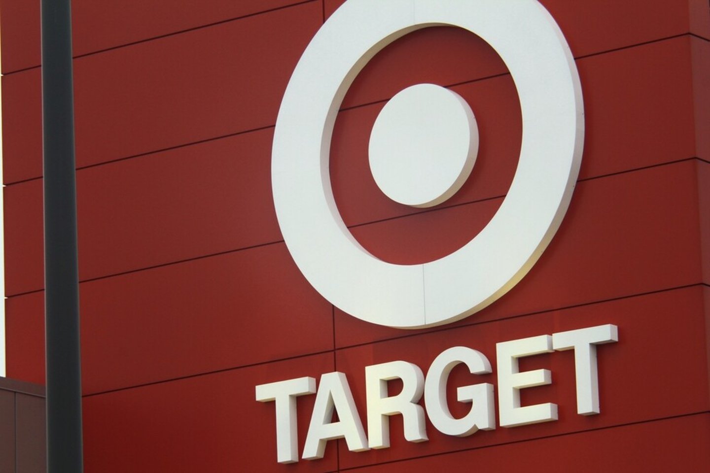 Bronx, NY - October 2, 2021: Target Corporation corporate logo on retail department store at the Throgs Neck Shopping Center.; Shutterstock ID 2063027351