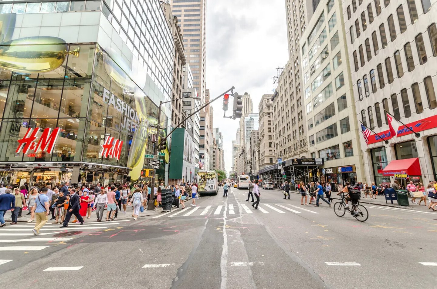 NEW YORK CITY - JUL 17: Traffic on 5th avenue on July 17, 2014 in New York. Fifth Avenue is a major thoroughfare in the center of the borough of Manhattan; Shutterstock ID 213805591
