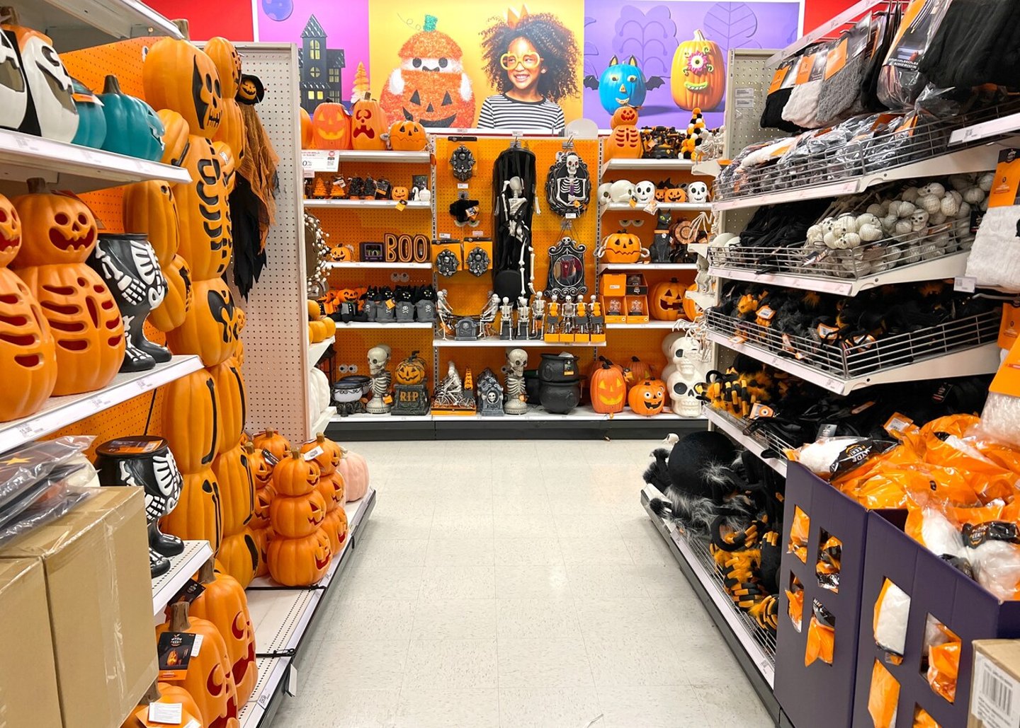 Alameda, CA - Sept 23, 2022: Department store aisle with Halloween decorations, packages prominently displayed.  Halloween retail spending was estimated at $9 billion in 2018; Shutterstock ID 2208185837