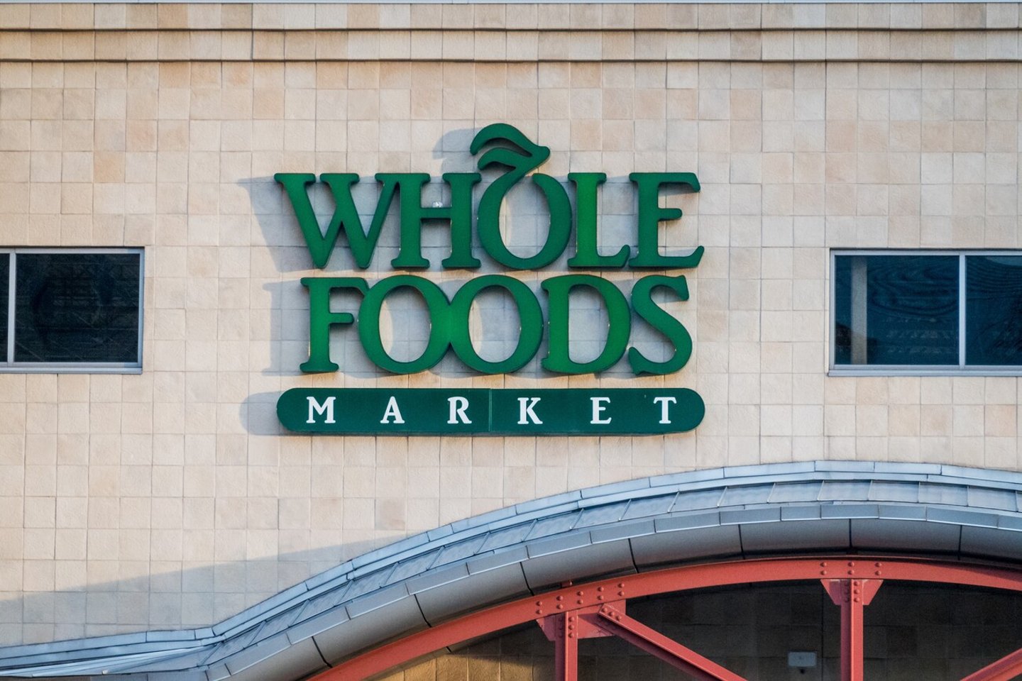 Denver, CO - May 15 2024: A sign for Whole Foods Market graces the facade of a building. ; Shutterstock ID 2464497601