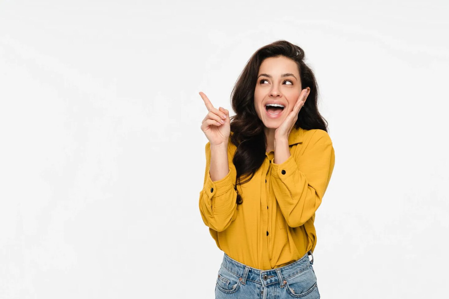 Photo of young funky excited positive woman girl sales manager wear casual clothes finger pointing up empty space for advertisement isolated on white color background; Shutterstock ID 2574735733