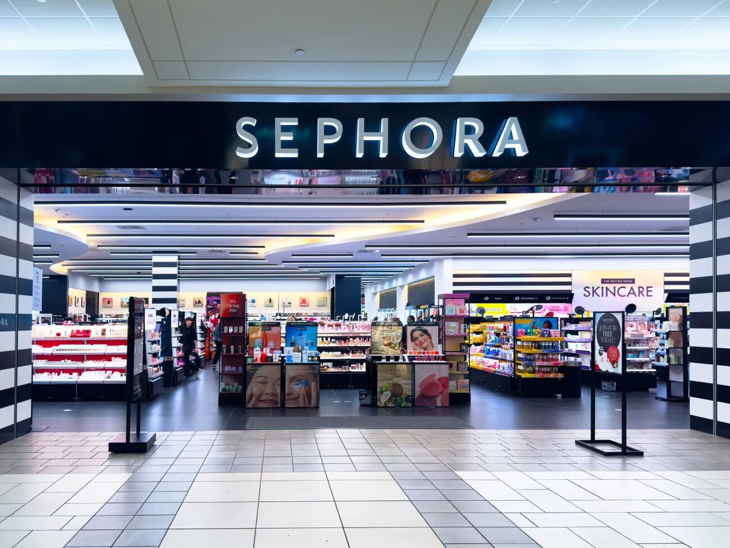 Calgary, Alberta, Canada. Apr 17, 2025. The entrance and inviting interior view of a Sephora retail store, showcasing various beauty products and displays.; Shutterstock ID 2614390145