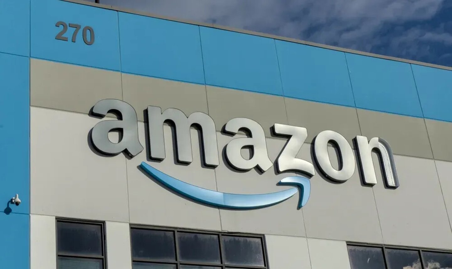 Brooklyn, NY - May 26, 2025: Amazon company logo with damaged letter 'n' on warehouse office building in Red Hook, Brooklyn, New York City.; Shutterstock ID 2639877371