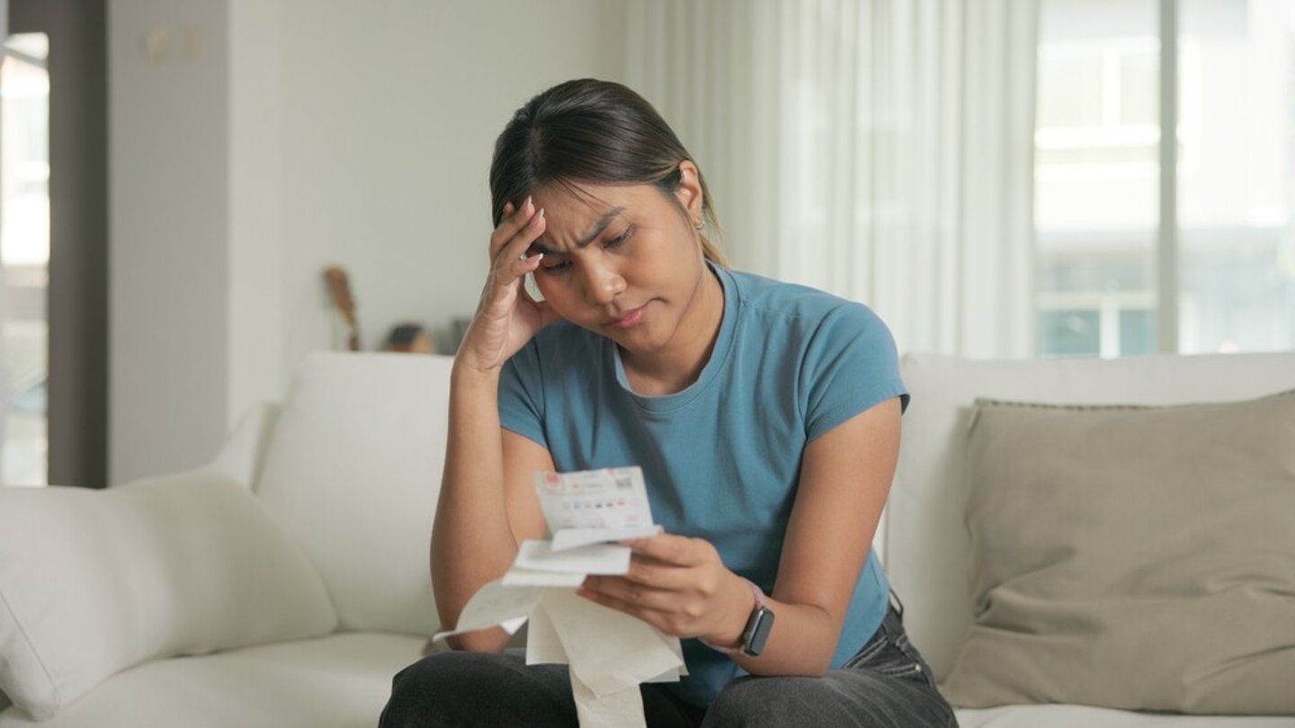 Cost of living low poor budget income black asia people Gen Z young adult woman. Looking opening Past due credit card bill debt home loan money issue asian worry tired stress in raise tax rate crisis.; Shutterstock ID 2650355361