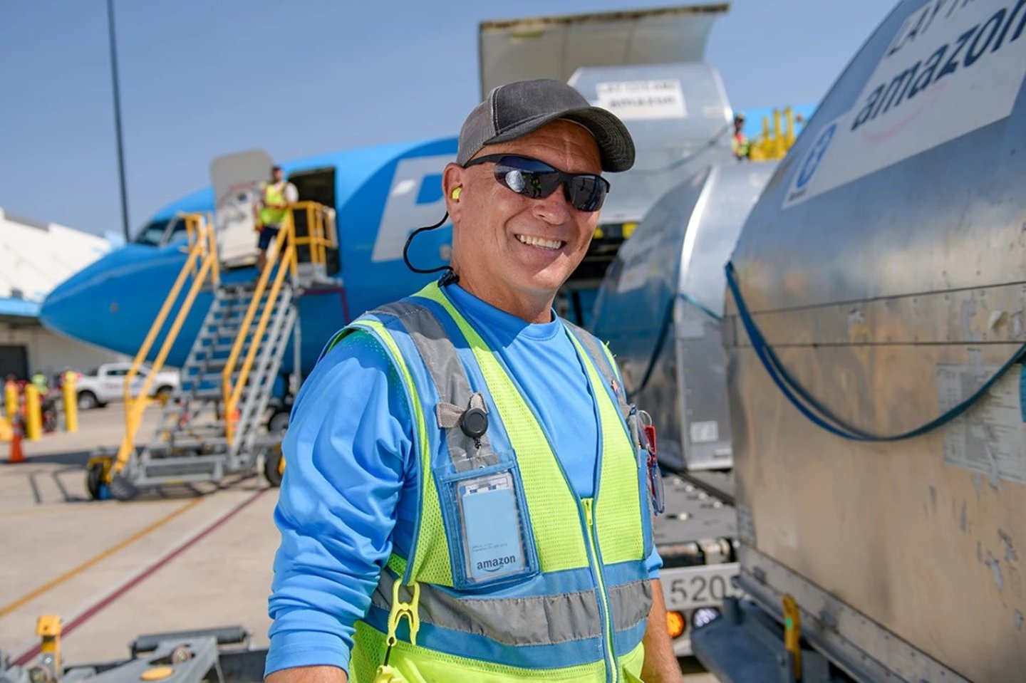 Amazon worker in safety vest.