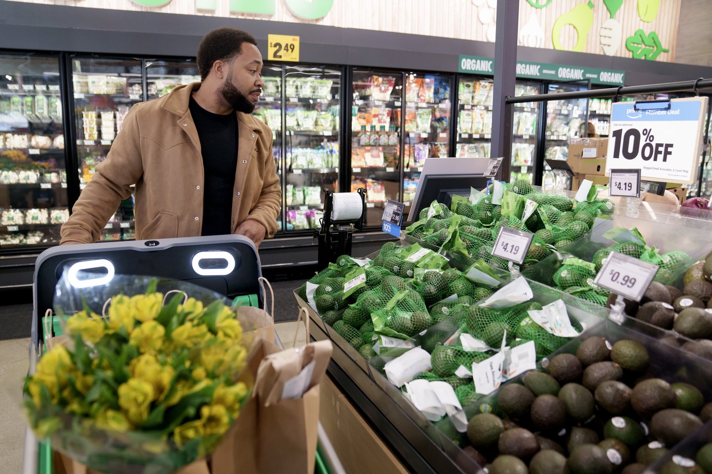 A shopper at an Amazon Fresh store (Photo: Amazon).