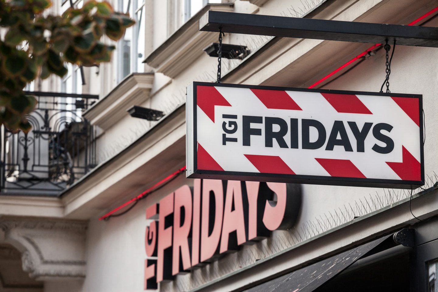 PRAGUE, CZECHIA - NOVEMBER 1, 2019: TGI Fridays logo in front of their restaurant for Prague. TGI Fridays is an American multinational chain of casual dining restaurants...; Shutterstock ID 1692745111