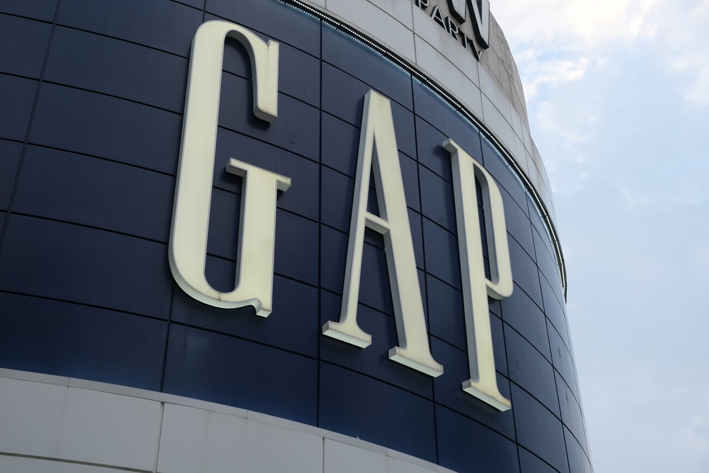 Shanghai,China-June 4th 2022: close up large GAP store sign; Shutterstock ID 2166049267