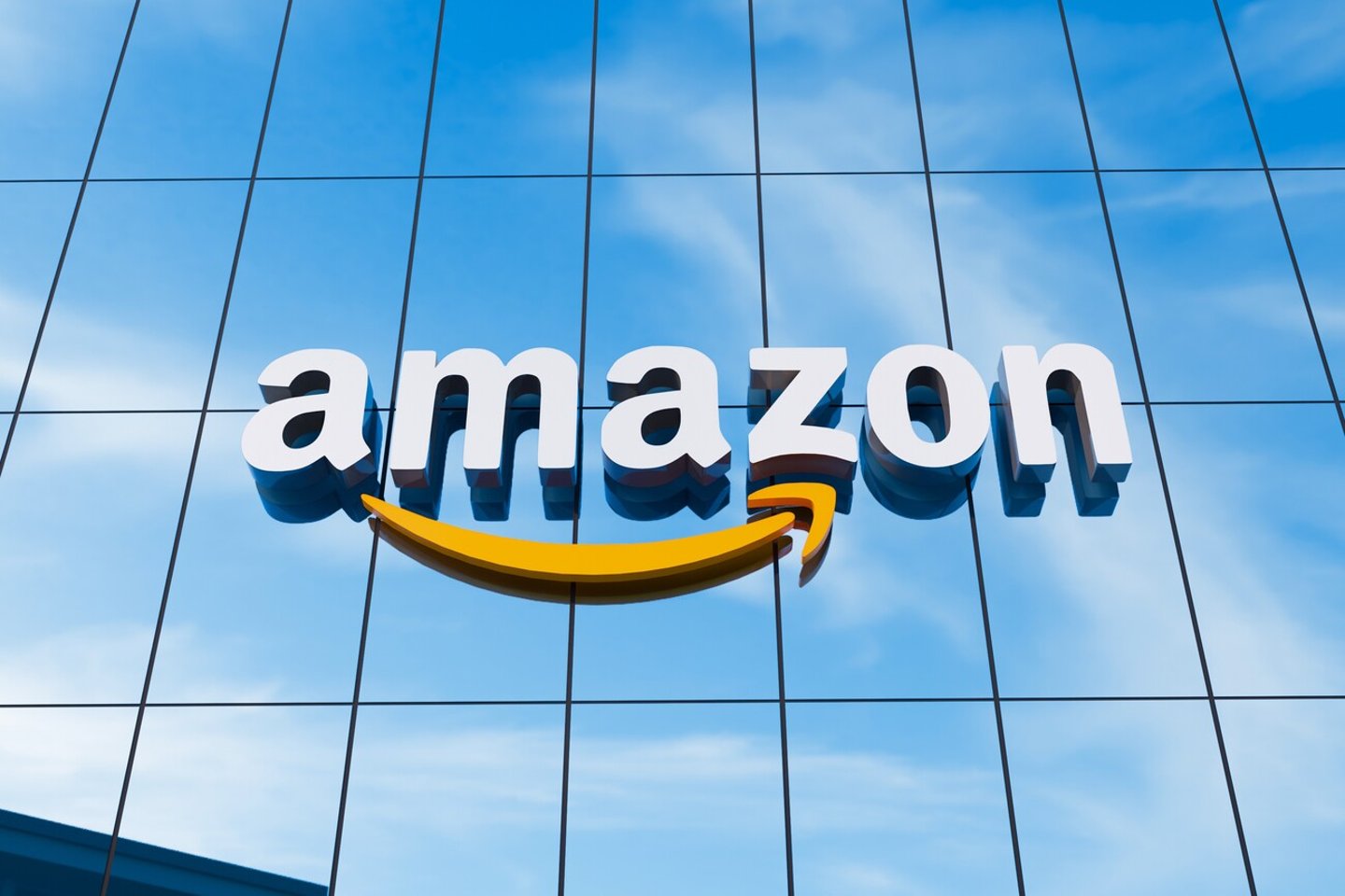 Pune, India - February 19, 2024. Amazon logo on the facade of the headquarter office, 3D Illustration.; Shutterstock ID 2427127531