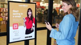 Earth Fare Zooey Deschanel sign