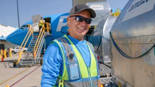 Amazon worker in safety vest.