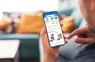 Walmart Marketplace shoppers on phone.