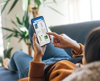 Walmart customer with mobile phone