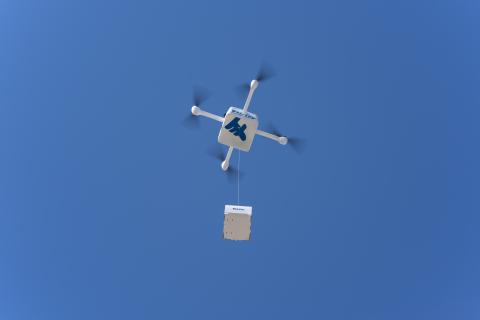 drone delivering package
