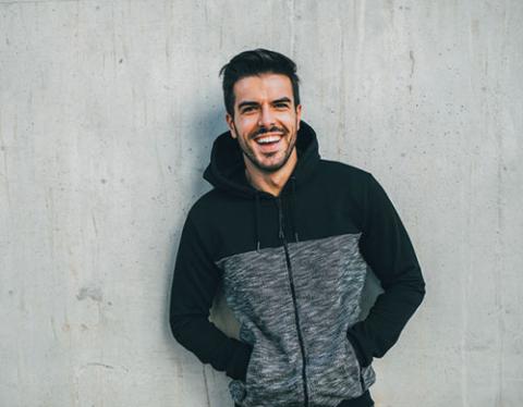 man posing with activewear