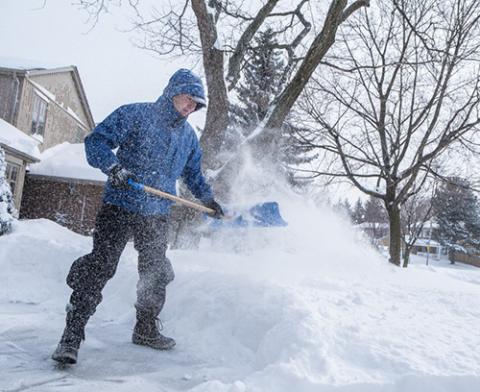 man shoveling snow