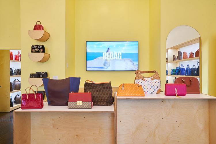 Rebag store interior with digital signage